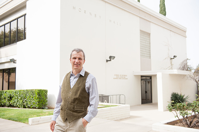 Professor Johannes Moenius outside the University of Redlands School of Business