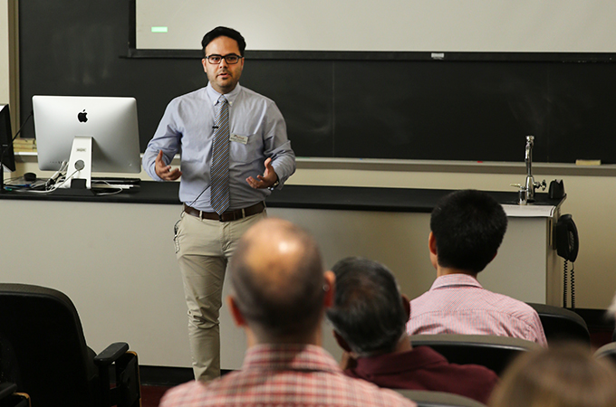 A University of Redlands professor presents his research during a faculty technology grant showcase.