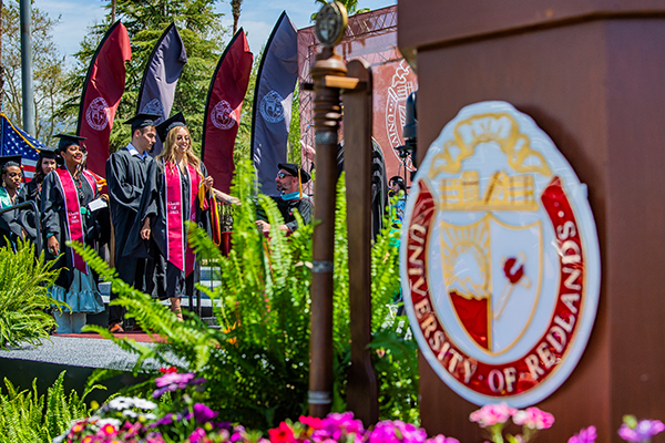 Commencement image with students in the background.jpg