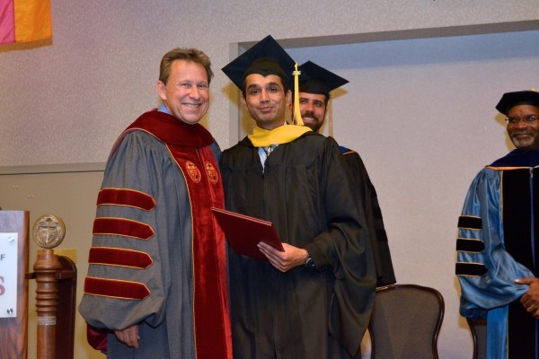 Student with Faculty at valediction